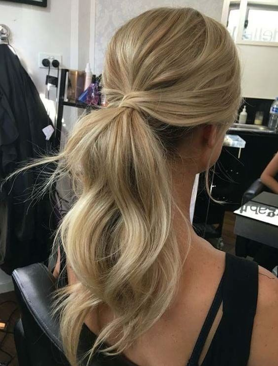 Wedding Hairstyles For Long Hair - Playful Ponytails Styling the classic wedding ponytail
